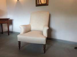 A French upholstered armchair